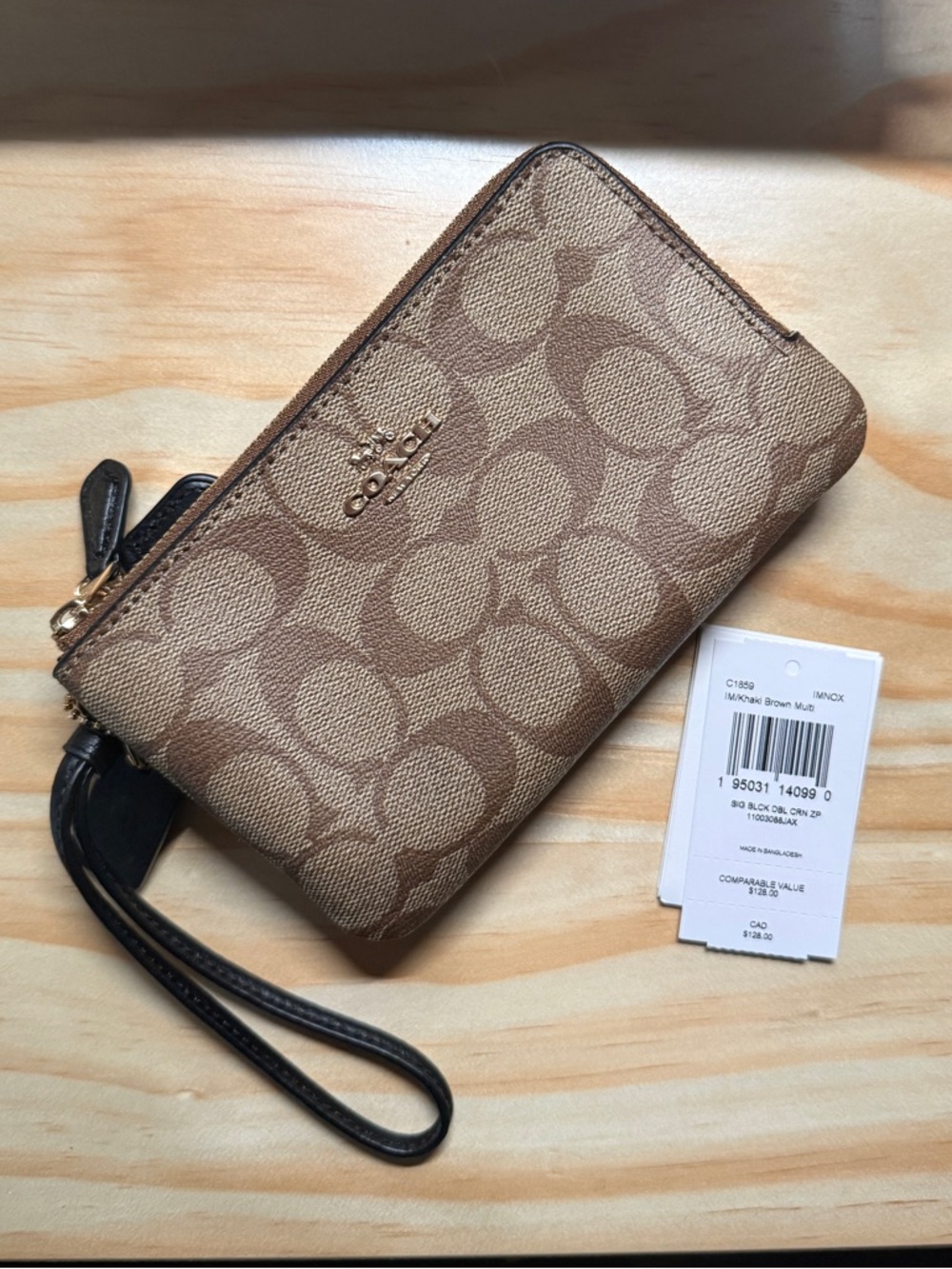 Coach monogram double zipper wristlet